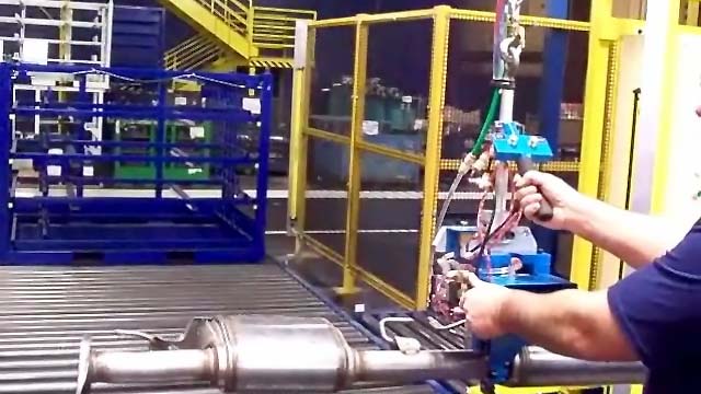 Automotive Muffler Lifting Device