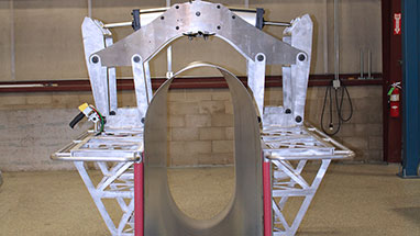 Lift Assist to Load Spiral Corrugated Ducts onto Ovalizer