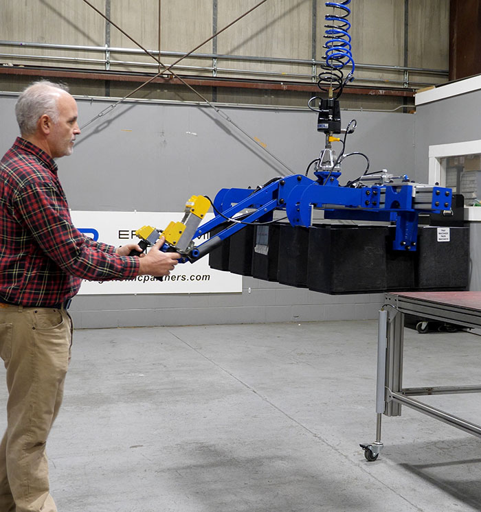 Pneumatic Grip and Lift Tool for Storage Containers