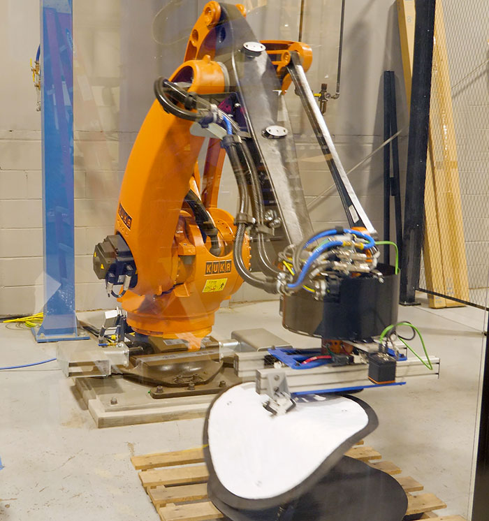 Robot with Needle Gripper and Needle Gripper Actuation for Felt Pads